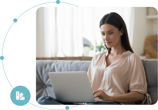 Woman personalizing a document on a home computer via the FlexiDocs interface.